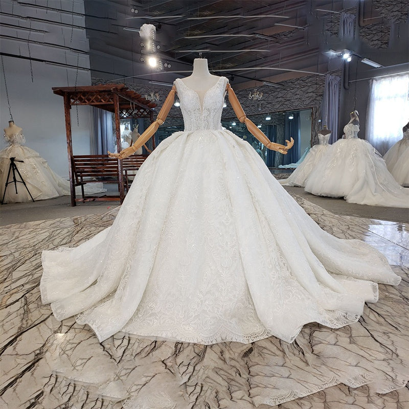 Really elegant designer Pakistani white embroidered long wedding dress