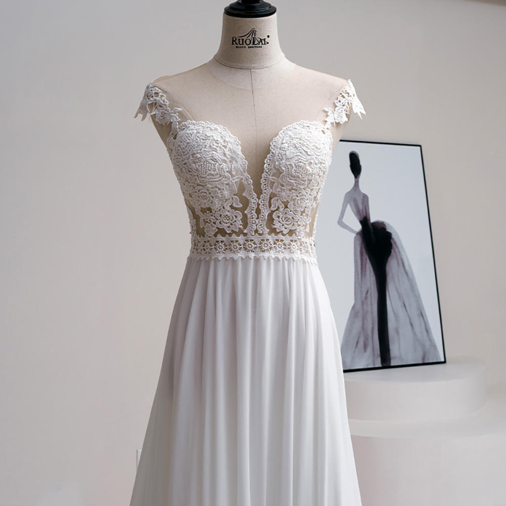 Novelty O-neck Short Sleeve Pearls Illusion Button Wedding Dresses For Women 2023