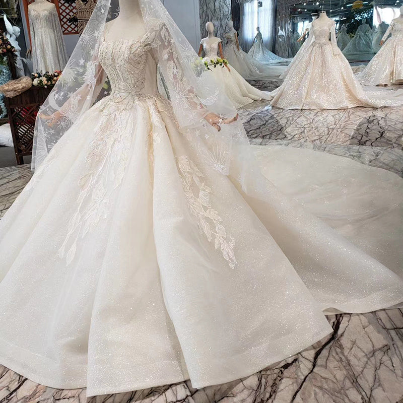 applique long sleeves with veil wedding dress